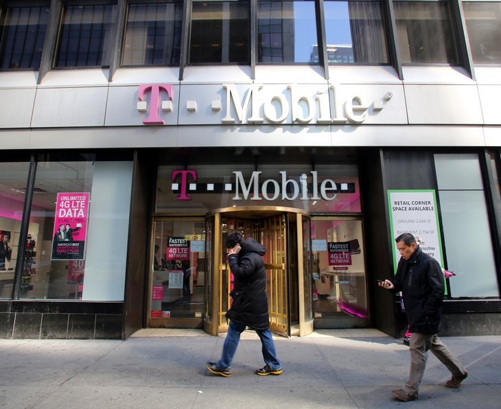 T-Mobile store front and pedestrians.